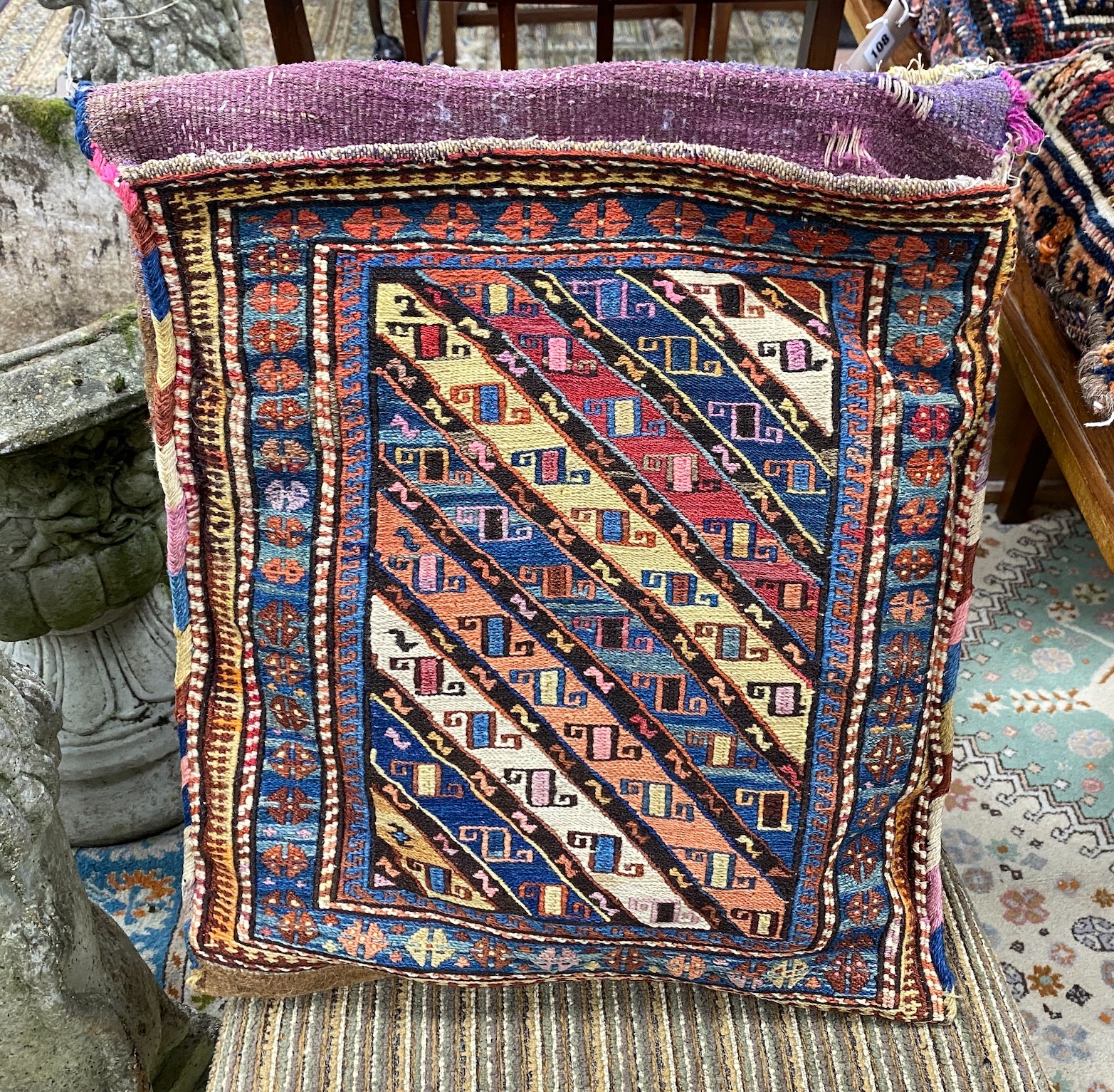 Three Persian salt bags made into cushions